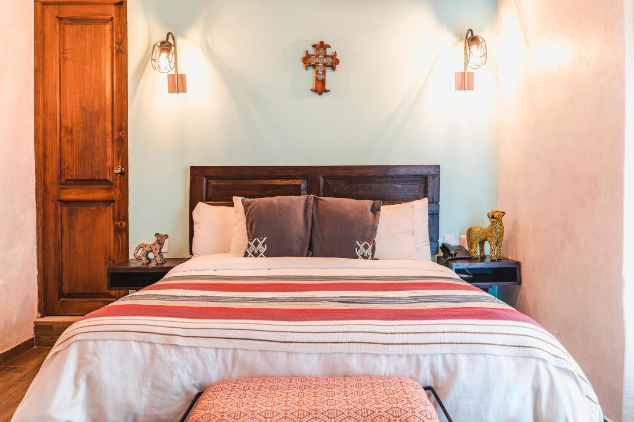 Yox Hotel Boutique San Cristóbal de Las Casas 外观 照片 A bedroom at the hotel