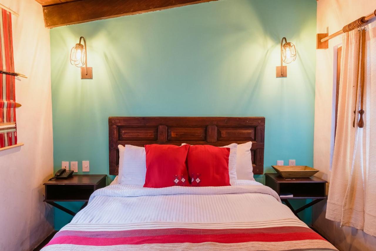 Yox Hotel Boutique San Cristóbal de Las Casas 外观 照片 A bedroom at the hotel