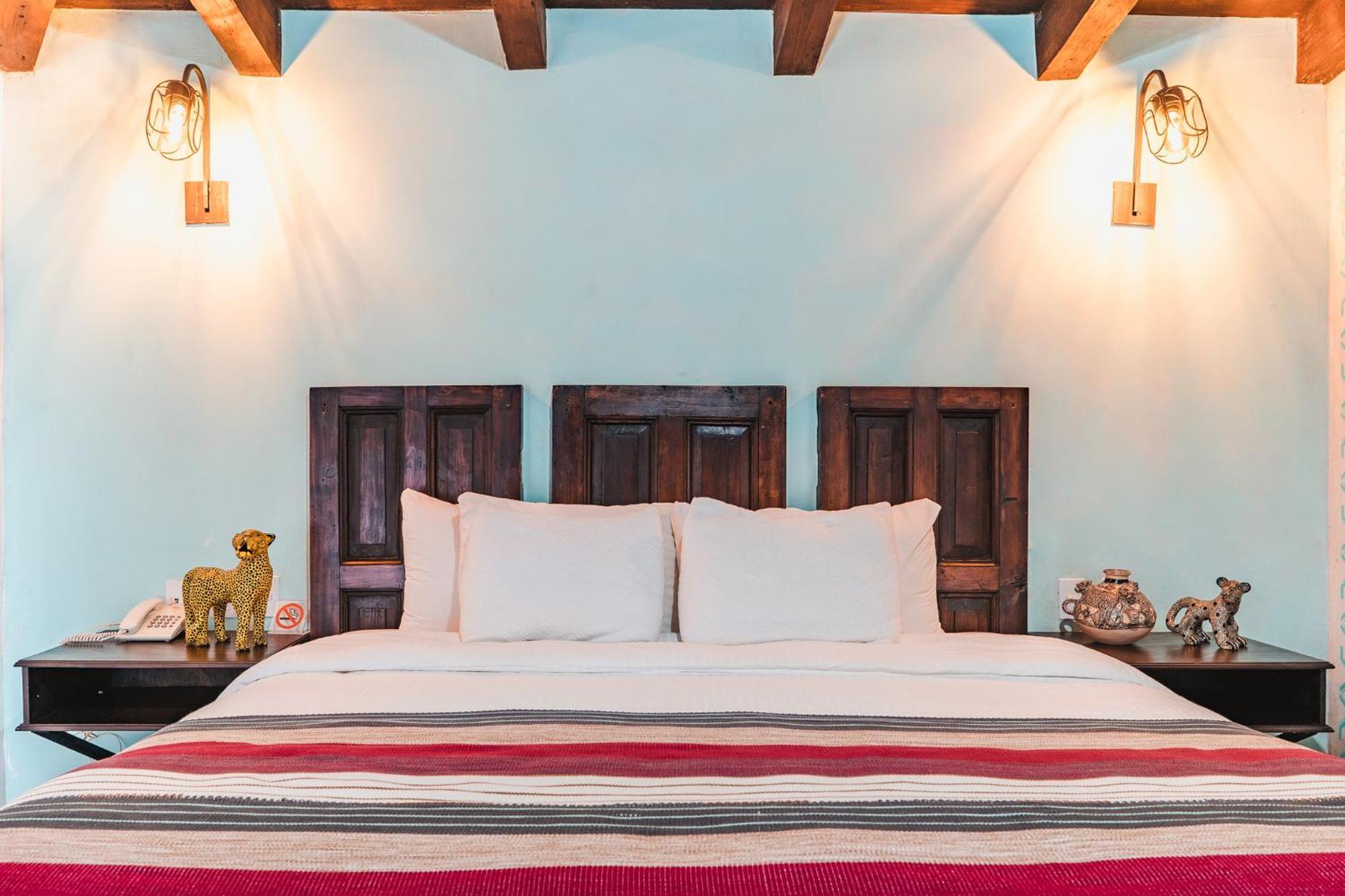 Yox Hotel Boutique San Cristóbal de Las Casas 客房 照片 A bedroom at the hotel